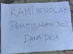 pamflet-aliansi-peduli-malra-pada-aski-demo-di-DPRD